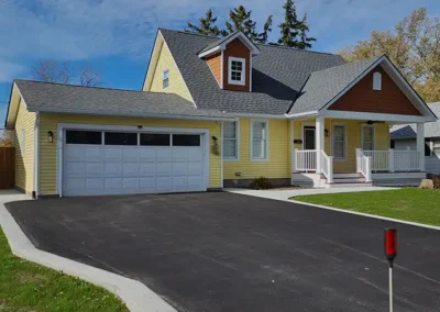 porch and dormer home addition with composite railing