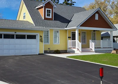 large gable porch and dormer addition to give new curb appeal on this beautiful home