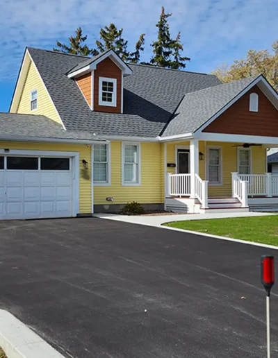 large gable porch and dormer addition to give new curb appeal on this beautiful home