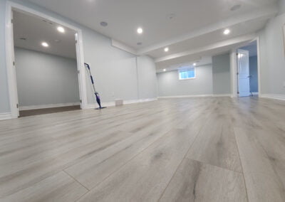 finished basement with luxury vinyl flooring