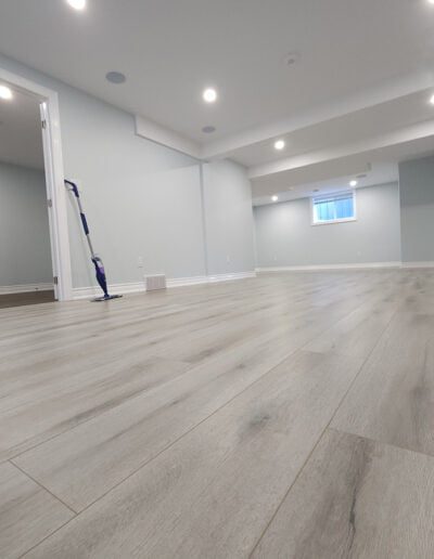 finished basement with luxury vinyl flooring