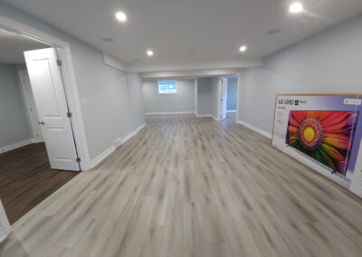 finished basement with luxury vinyl flooring